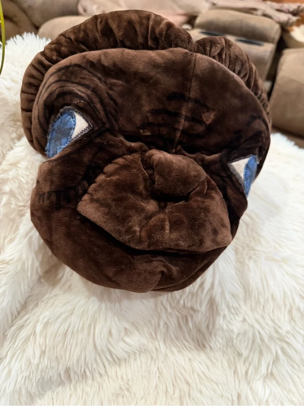 ET. Brown Plush Novelty Accent Pillow with Blue Eye